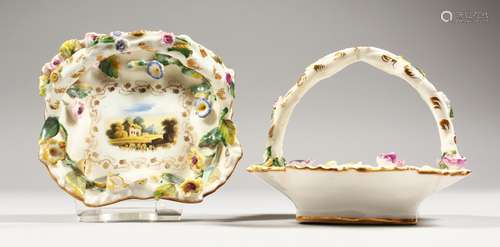 A SMALL PAIR OF ROCKINGHAM FLOWER ENCRUSTED BASKETS, the centres painted with a house. Griffin