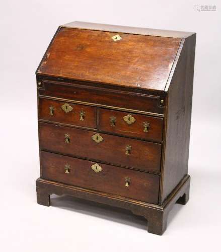 A GOOD SMALL 18TH CENTURY BUREAU, with fall front, fitted interior with well, two short and two long