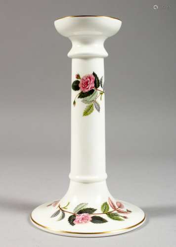 A WEDGWOOD PORCELAIN HATHAWAY ROSE CANDLESTICK. 7ins high.