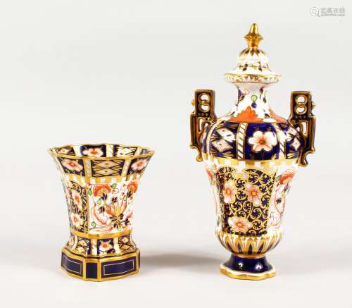 A ROYAL CROWN DERBY JAPAN PATTERN TWO-HANDLED VASE AND COVER, 8ins high, and A SPILL VASE, 4ins high