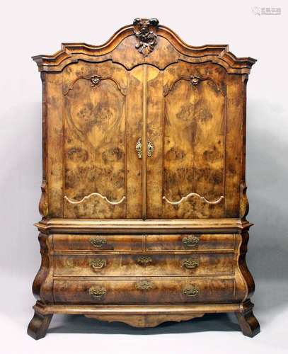 A GOOD 18TH CENTURY FRENCH OAK PRESS CUPBOARD, with a carved and moulded cornice, two panelled