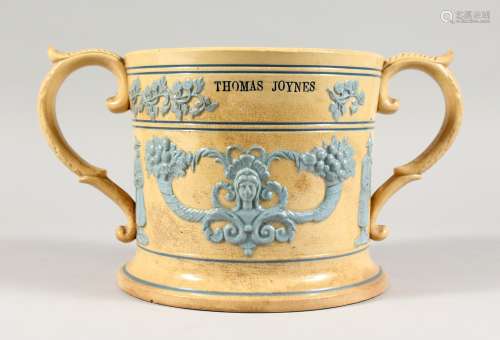 A LARGE 19TH CENTURY GLAZED POTTERY LOVING CUP, with pale blue sprig decoration, impressed THOMAS