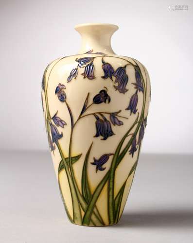 A MOORCROFT POTTERY VASE, cream ground with bluebells. 2001. 120/300. 6ins high.