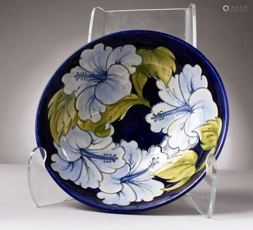 A GOOD MOORCROFT BLUE GROUND CIRCULAR BOWL, 