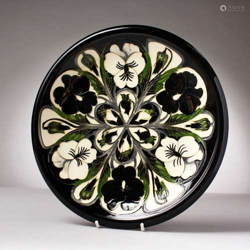 A MOORCROFT CIRCULAR DISH, 2003. 10ins diameter.