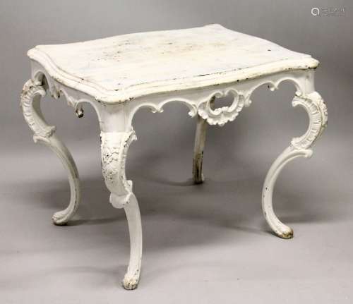 A MAHOGANY CENTRE TABLE, possibly 18th century, with moulded top of serpentine outline, pierced