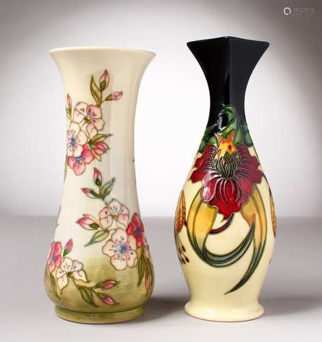 TWO MOORCROFT POTTERY VASES. 8ins and 8.5ins high.