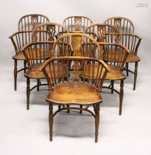 A SET OF SIX 19TH CENTURY YEW AND ELM WINDSOR ARMCHAIRS, with pierced back splats, and crinoline