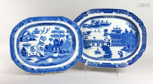 TWO WILLOW PATTERN BLUE AND WHITE SERVING DISHES (one AF). 19.5ins and 20.5ins .