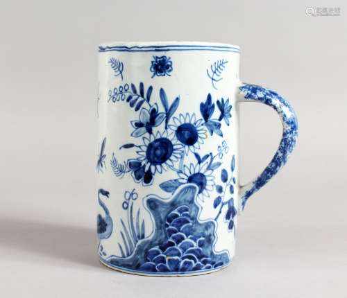 A DELFT STYLE BLUE AND WHITE TIN GLAZED TANKARD, painted with Masonic symbols, birds, insects and