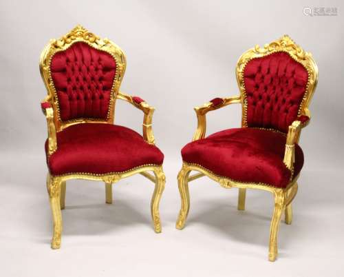 A PAIR OF GILT FRAMED FRENCH STYLE ARMCHAIRS.