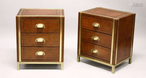 A GOOD PAIR OF BRASS BOUND LEATHER UPHOLSTERED THREE DRAWER CHESTS.