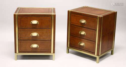 A GOOD PAIR OF BRASS BOUND LEATHER UPHOLSTERED THREE DRAWER CHESTS.