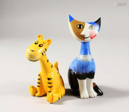 A SMALL GOEBEL FIGURE OF A STYLIZED SEATED CAT and another figure of a tiger, with Walt Disney