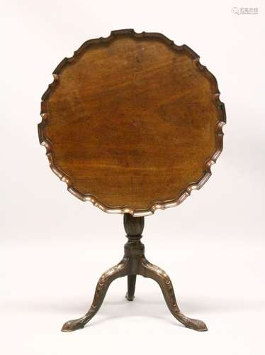 A GEORGE III MAHOGANY PIECRUST TILT TOP TRIPOD TABLE, the base with later carved decoration. 2ft