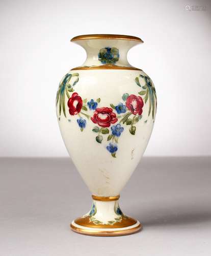 A MOORCROFT POTTERY MACINTYRE VASE, garland of roses and ribbons. Script signature W. Moorcroft in