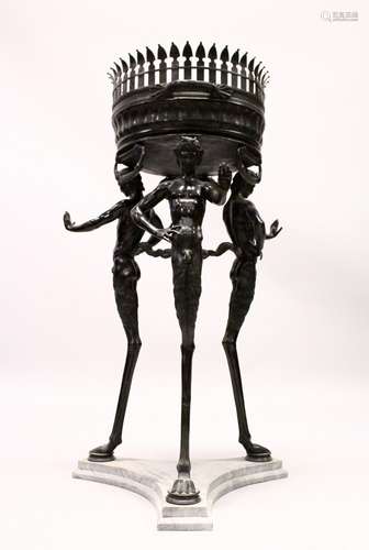 AN UNUSUAL BRONZE JARDINIERE, with lancet decorated circular bowl, supported on three Pan like