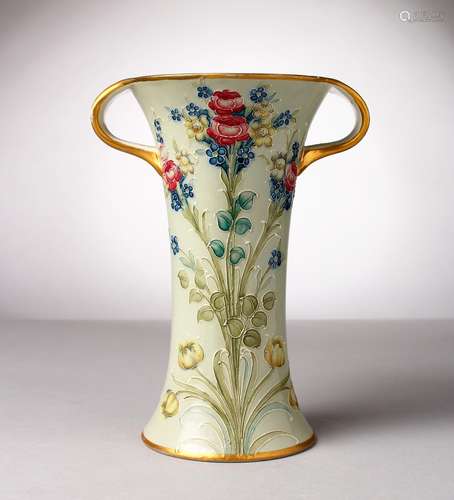 A MOORCROFT MACINTYRE POTTERY TWO-HANDLED VASE, green ground, edge in gilt with flowers. Script