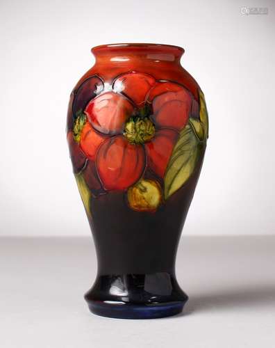 A MOORCROFT POTTERY VASE, blue ground, 