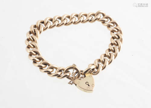 A 9ct gold padlock clasp curb link bracelet, 19g