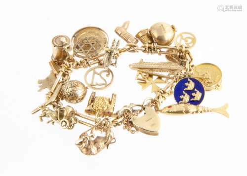 An 18ct gold converted watch chain, set with twenty five mixed gold charms, including Spanish