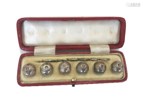 A set of Thai bullet money dress studs, the Pot Duong tooth link coins with applied loops, in fitted