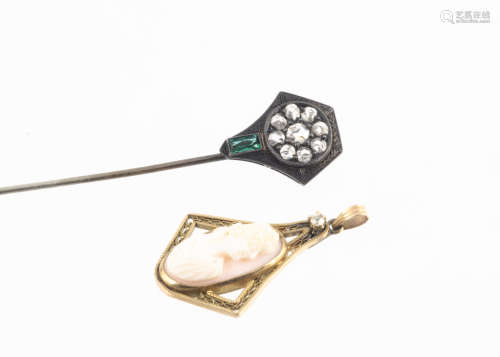 An Edwardian gem set silver stick pin, the rough cut white stones within an engraved hexagonal mount