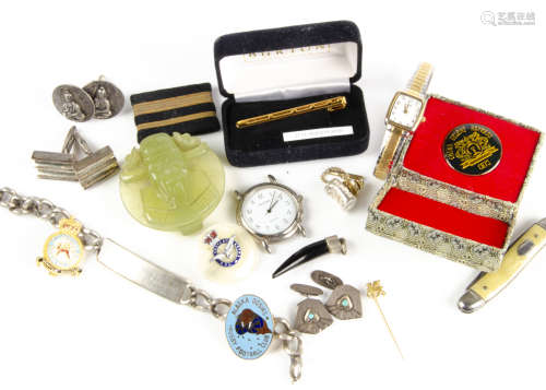 A collection of silver cufflinks, a silver identity bracelet of curb link design, a silver dagger