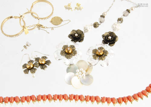 A collection of miscellaneous costume jewellery, including various bangles, beads, gilt metal