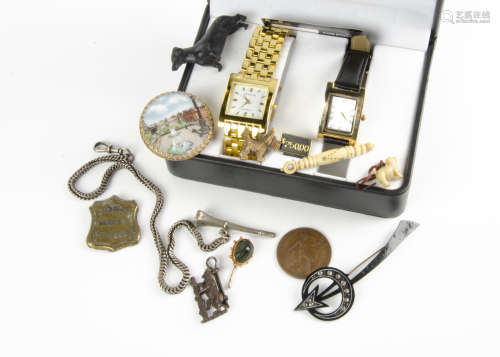 A collection of miscellaneous jewellery, including a white metal watch key and chain, a scarab