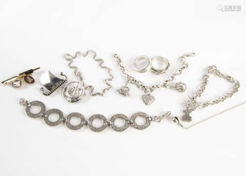 A collection of silver jewellery, including a silver galleon brooch hallmarked Chester, a Danish