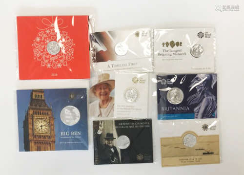 Eight modern Royal Mint fine silver coins, each in presentation pack, including a £100 2015 Big Ben,