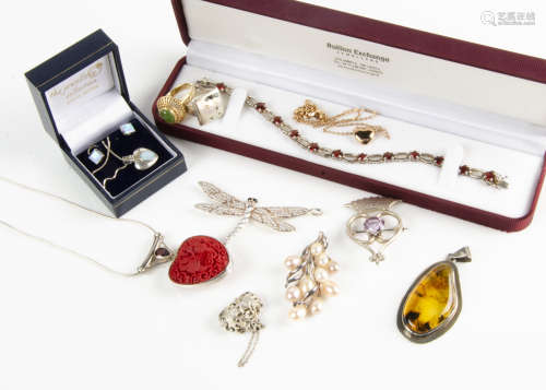 A collection of silver and gem set jewellery, including a paste set dragonfly pendant, an amber