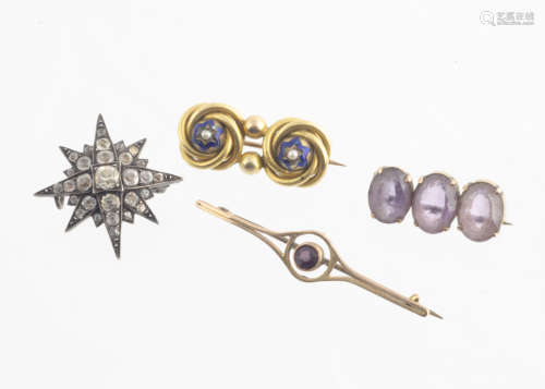 Four 19th Century brooches, including a paste set silver star, 3cm, a double pinchbeck and enamel