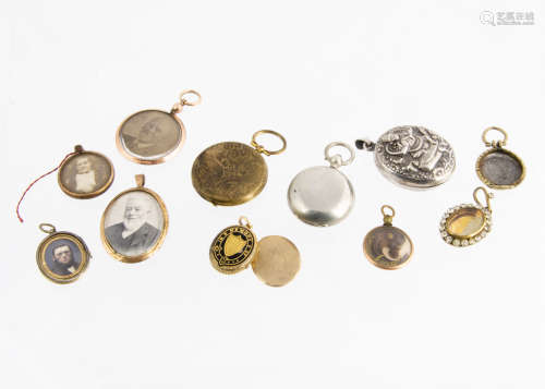 A collection of white metal, silver plated, gold framed and plated lockets, including an Indian