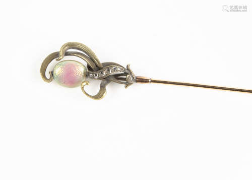 An Art Nouveau gold, diamond, enamel and opal hat pin, the oval spinning enamel and opal flower head