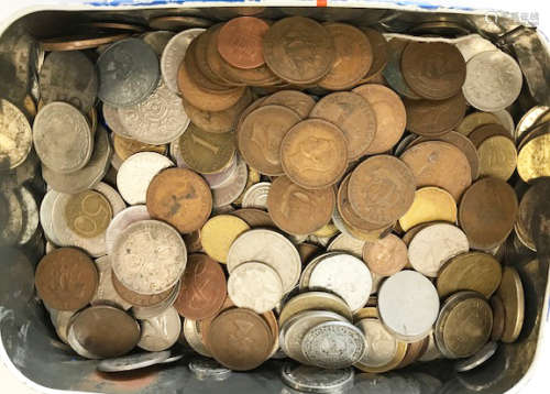 A collection of coins and other items, including stamps, postcards, bank notes, and matchboxes