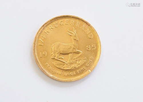 A 1980s South African gold quarter krugerrand, dated 1985, 8.4g, EF