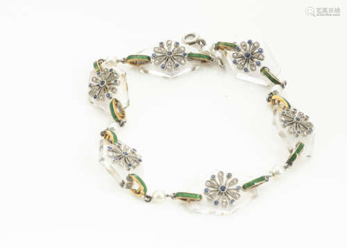 A French Art Deco sapphire and diamond, enamel and pearl glass set bracelet, the elongated glass