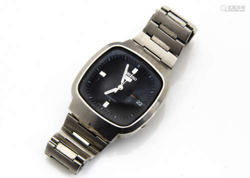 A c1980s Seiko 5 automatic stainless steel gentleman~s wristwatch, 36mm squared case, batons to