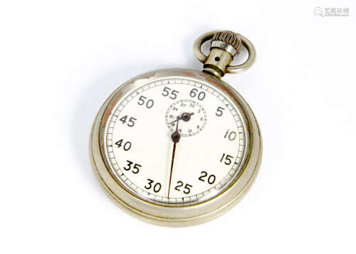 A vintage pocket stopwatch, in Dennison case, appears to run
