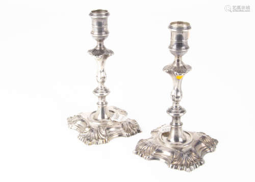 A pair of interesting 19th Century Irish silver candlesticks from ID, in the Georgian taste, 29.5
