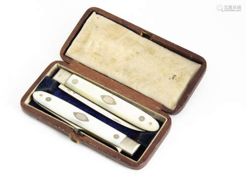 A George III silver and mother of pearl campaign folding knife and fork set, presented in a fitted
