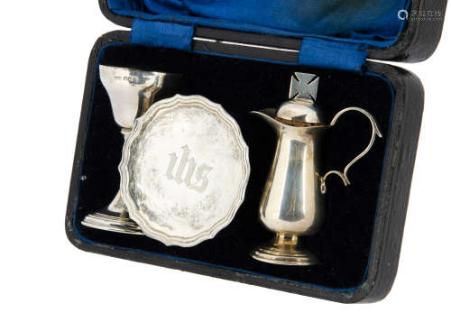 A cased George V silver travelling communion set by James Dixon & Sons, the fitted box with