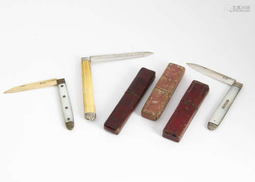 Three George III and later silver bladed folding pocket fruit knives, each with a card box, one with