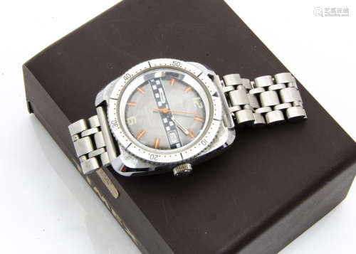 A c1970s Timex stainless steel gentleman~s wristwatch, 35mm tonneau case with checker effect and