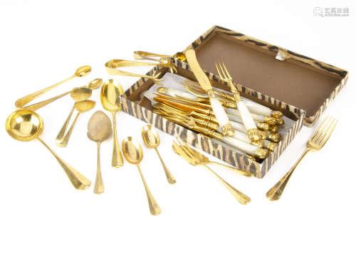 A canteen of gilt cutlery, a large quantity, together with a mother of pearl handled dessert