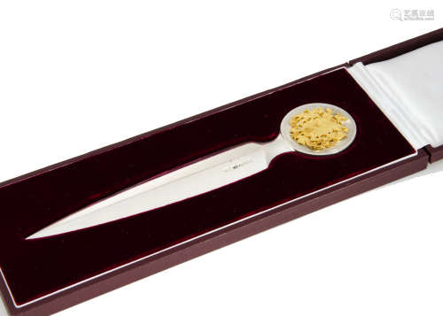 A 1970s fine silver letter opener from Grant Macdonald, presented in a fitted GM maroon box, the
