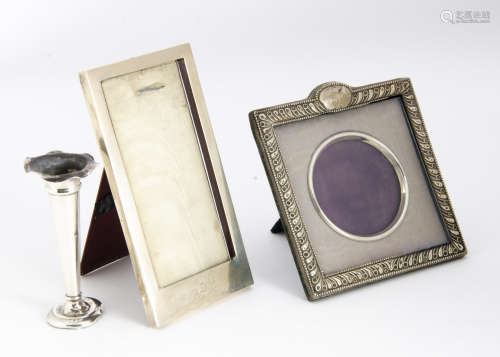 An Edwardian silver fronted square photograph frame, AF, together with a rectangular German silver