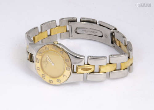 A modern Baume & Mercier stainless steel and gilt gentleman~s mid-sized evening dress watch, 29mm